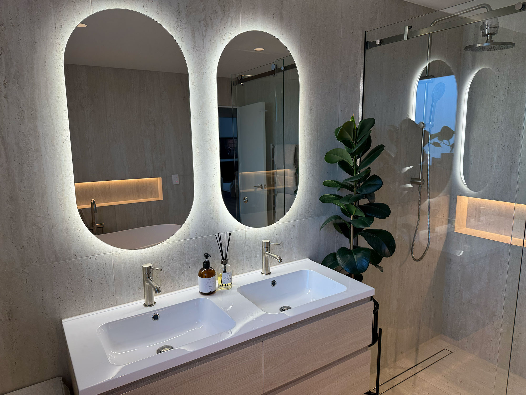 bathroom with mirror and lighting