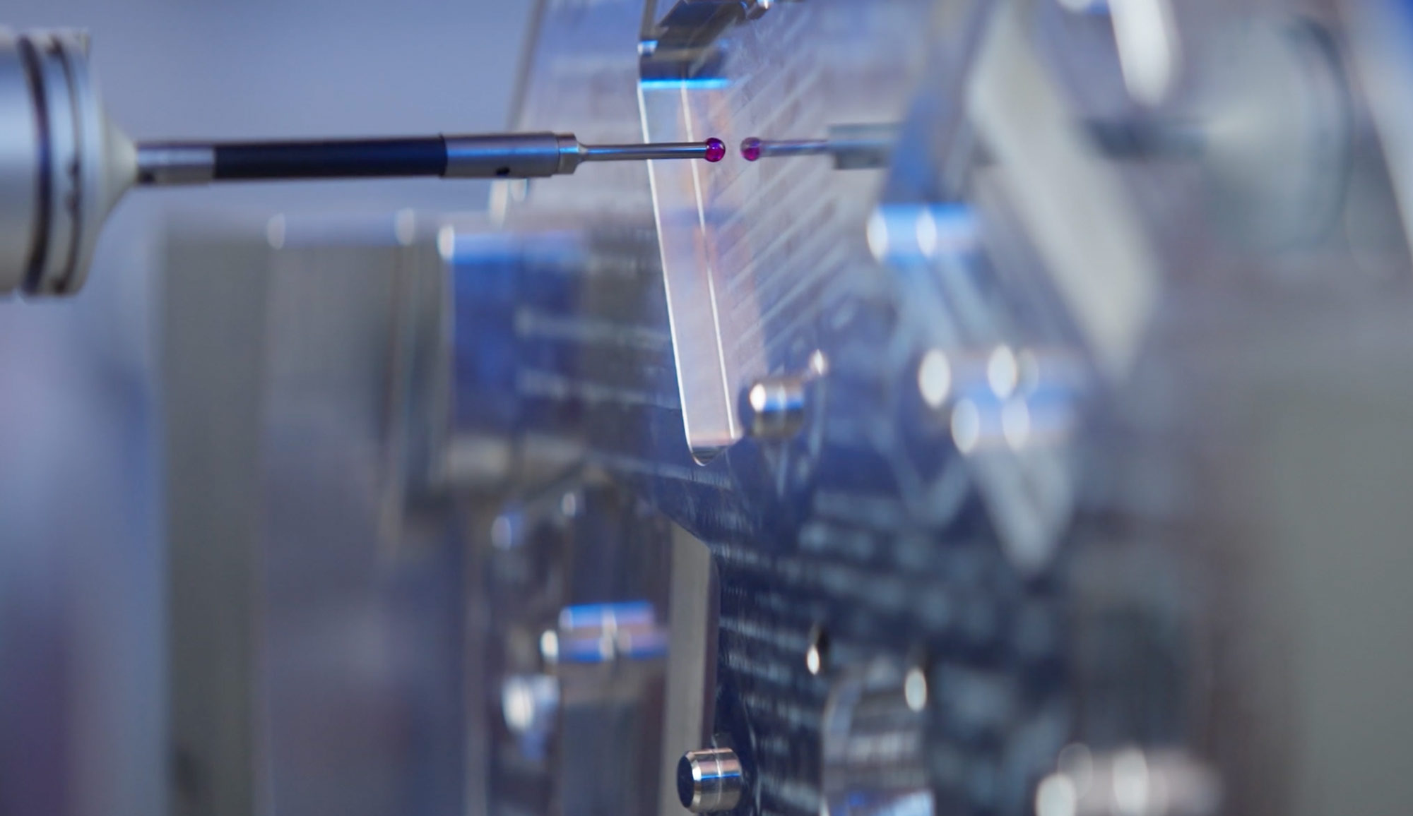 Coordinate measuring machine inspecting a precision machined component in United Machinists’ quality control room
